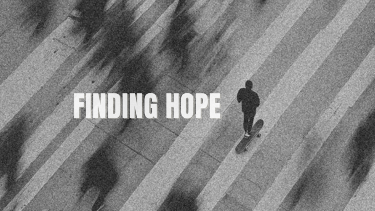A person walking against the crowd on a busy road, symbolizing that, sometimes, you need to dream and hope big to reach your destination.